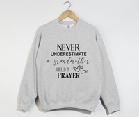Load image into Gallery viewer, Never Underestimate A Grandmother Fueled By Prayer - Sweatshirt
