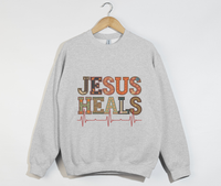 Load image into Gallery viewer, Jesus Heals The Brokenhearted - Sweatshirt
