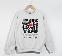 Load image into Gallery viewer, Jesus Loves You, He Loved Us First - Christian Sweatshirt
