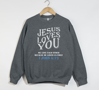Load image into Gallery viewer, Jesus Loves You, He Loved Us First - Christian Sweatshirt

