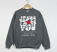 Load image into Gallery viewer, Jesus Loves You, He Loved Us First - Christian Sweatshirt
