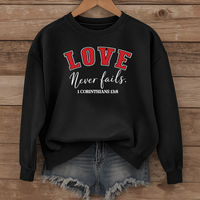 Load image into Gallery viewer, Love Never Fails Unisex Sweatshirt