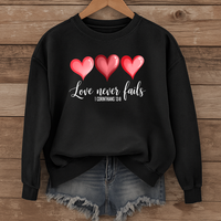 Load image into Gallery viewer, Love Never Fails Christian Sweatshirt, Faith Based Valentine Gift Crewneck, 3 Heart Design, Corinthians 13:8