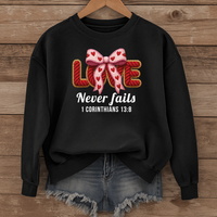 Load image into Gallery viewer, Love Never Fails Christian Sweatshirt, Faith Based Women's Valentine Gift, Yarn Bow Coquette Design, Corinthians 13:8