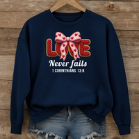 Load image into Gallery viewer, Love Never Fails Christian Sweatshirt, Faith Based Women's Valentine Gift, Yarn Bow Coquette Design, Corinthians 13:8