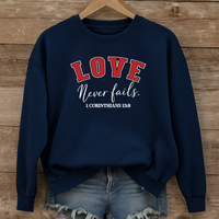 Load image into Gallery viewer, Love Never Fails Unisex Sweatshirt