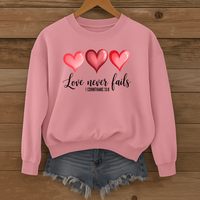 Load image into Gallery viewer, Love Never Fails Christian Sweatshirt, Faith Based Valentine Gift Crewneck, 3 Heart Design, Corinthians 13:8