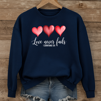 Load image into Gallery viewer, Love Never Fails Christian Sweatshirt, Faith Based Valentine Gift Crewneck, 3 Heart Design, Corinthians 13:8