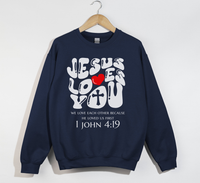 Load image into Gallery viewer, Jesus Loves You, He Loved Us First - Christian Sweatshirt
