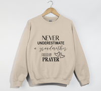 Load image into Gallery viewer, Never Underestimate A Grandmother Fueled By Prayer - Sweatshirt
