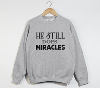 Load image into Gallery viewer, He Still Does Miracles - Christian Sweatshirt
