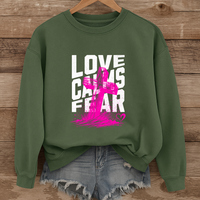 Load image into Gallery viewer, Love Calms Fear - Cozy Sweatshirt
