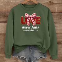 Load image into Gallery viewer, Love Never Fails Christian Sweatshirt, Faith Based Women's Valentine Gift, Yarn Bow Coquette Design, Corinthians 13:8