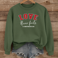 Load image into Gallery viewer, Love Never Fails Unisex Sweatshirt