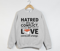 Load image into Gallery viewer, Hatred Stirs Up Conflict, But Love Covers All Wrongs - Sweatshirt
