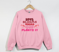 Load image into Gallery viewer, Love Blooms Where God Plants It - Sweatshirt
