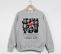 Load image into Gallery viewer, Jesus Loves You, He Loved Us First - Christian Sweatshirt
