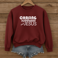 Load image into Gallery viewer, Chasing Toddlers and Jesus Sweatshirt, Funny Christian Shirt, Unisex Faith Pullover for Parents