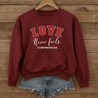 Load image into Gallery viewer, Love Never Fails Unisex Sweatshirt