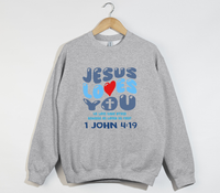 Load image into Gallery viewer, Jesus Loves You, He Loved Us First - Christian Sweatshirt
