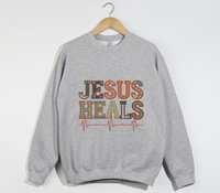 Load image into Gallery viewer, Jesus Heals The Brokenhearted - Sweatshirt
