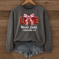 Load image into Gallery viewer, Love Never Fails Christian Sweatshirt, Faith Based Women's Valentine Gift, Yarn Bow Coquette Design, Corinthians 13:8