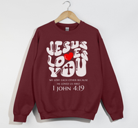 Load image into Gallery viewer, Jesus Loves You, He Loved Us First - Christian Sweatshirt
