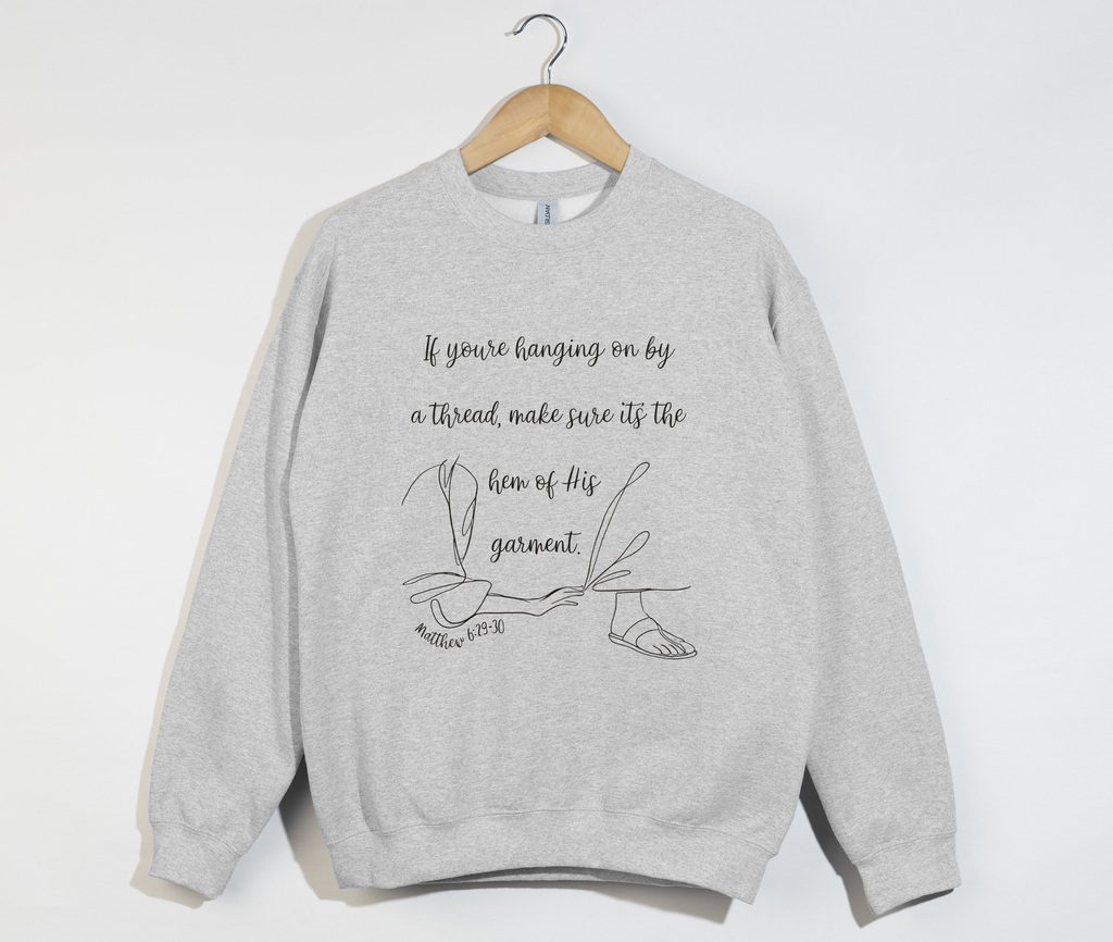 The Hem Of His Garment - Christian Sweatshirt