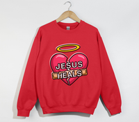 Load image into Gallery viewer, Jesus Heals The Brokenhearted - Sweatshirt
