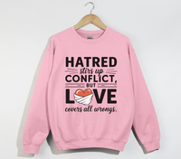 Load image into Gallery viewer, Hatred Stirs Up Conflict, But Love Covers All Wrongs - Sweatshirt

