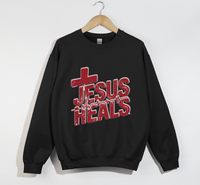 Load image into Gallery viewer, Jesus Heals The Brokenhearted - Sweatshirt
