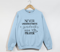 Load image into Gallery viewer, Never Underestimate A Grandmother Fueled By Prayer - Sweatshirt
