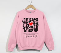 Load image into Gallery viewer, Jesus Loves You, He Loved Us First - Christian Sweatshirt
