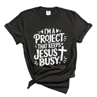 Load image into Gallery viewer, I'm A Project That Keeps Jesus Busy - Comfort Colors Tee