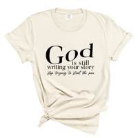 Load image into Gallery viewer, God Is Still Writing Your Story Comfort Colors Tee