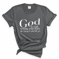 Load image into Gallery viewer, God Is Still Writing Your Story Comfort Colors Tee