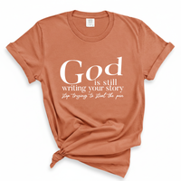 Load image into Gallery viewer, God Is Still Writing Your Story Comfort Colors Tee