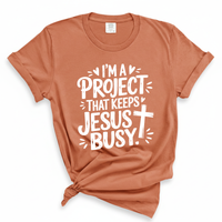 Load image into Gallery viewer, I'm A Project That Keeps Jesus Busy - Comfort Colors Tee