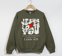 Load image into Gallery viewer, Jesus Loves You, He Loved Us First - Christian Sweatshirt

