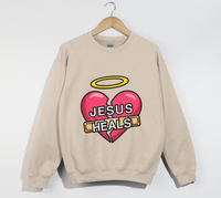 Load image into Gallery viewer, Jesus Heals The Brokenhearted - Sweatshirt

