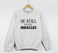 Load image into Gallery viewer, He Still Does Miracles - Christian Sweatshirt
