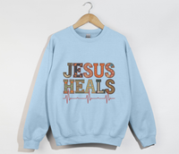 Load image into Gallery viewer, Jesus Heals The Brokenhearted - Sweatshirt

