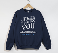 Load image into Gallery viewer, Jesus Loves You, He Loved Us First - Christian Sweatshirt
