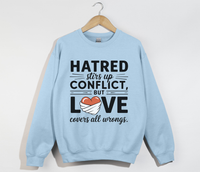 Load image into Gallery viewer, Hatred Stirs Up Conflict, But Love Covers All Wrongs - Sweatshirt
