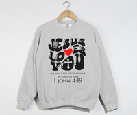 Load image into Gallery viewer, Jesus Loves You, He Loved Us First - Christian Sweatshirt
