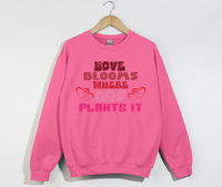 Load image into Gallery viewer, Love Blooms Where God Plants It - Sweatshirt

