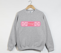 Load image into Gallery viewer, Jesus Heals - Christian Sweatshirt
