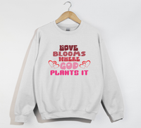 Load image into Gallery viewer, Love Blooms Where God Plants It - Sweatshirt

