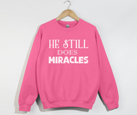 Load image into Gallery viewer, He Still Does Miracles - Christian Sweatshirt
